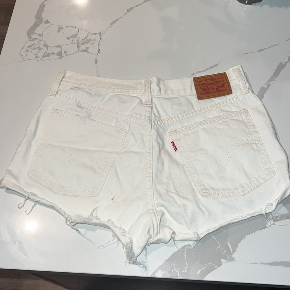 White Levi Cutoffs